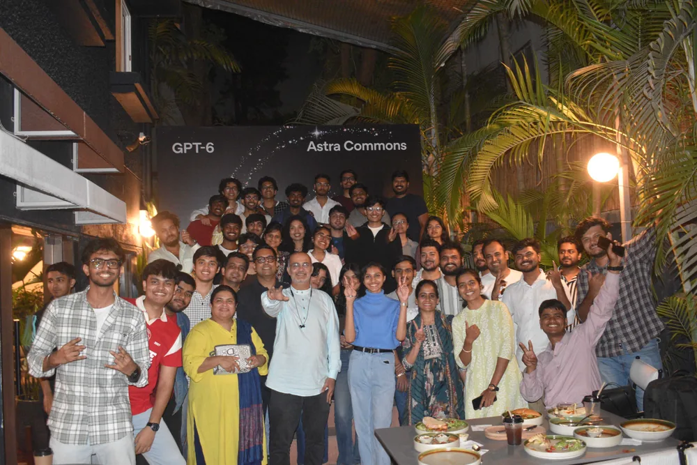Attendees gathering for a group photo at Astra Commons in Pune